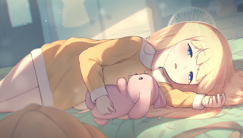 1girl absurdres bangs bed blonde_hair blue_eyes blurry blurry_background blush commission dress drowsy electric_fan english_commentary female_child half-closed_eyes hat hat_removed headwear_removed highres hoplitx indoors long_hair long_sleeves lying on_bed on_side original pajamas parted_lips sleepy solo stuffed_animal stuffed_bunny stuffed_toy yellow_dress yellow_headwear