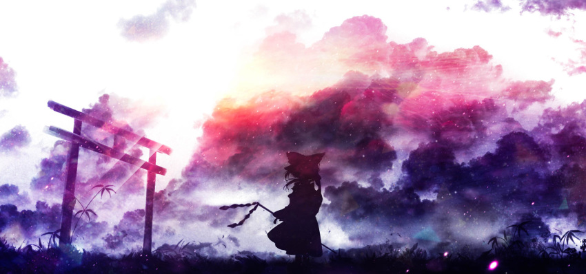 1girl akyuun bow clouds cloudy_sky english_commentary field gohei hair_bow hakurei_reimu highres holding_gohei landscape light_particles scenery shide silhouette skirt sky solo sunlight torii touhou wide_shot