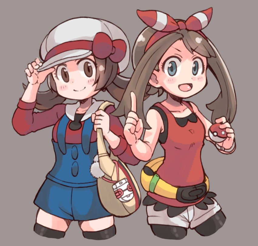 2girls bag bangs bike_shorts bike_shorts_under_shorts black_thighhighs blue_eyes bow bow_hairband brown_eyes brown_hair cropped_legs es_(eisis) grey_background hairband hat hat_bow highres holding holding_bag holding_poke_ball index_finger_raised long_sleeves looking_at_viewer low_twintails lyra_(pokemon) may_(pokemon) multiple_girls open_mouth overalls poke_ball pokegear pokemon pokemon_(game) pokemon_hgss pokemon_oras red_bow shorts simple_background smile tank_top thigh-highs twintails white_headwear white_shorts