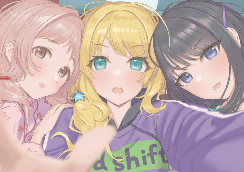 3girls :o ahoge black_hair blonde_hair blurry blurry_background blush depth_of_field foreshortening hachimiya_meguru hair_over_shoulder hand_on_another's_shoulder highres idolmaster idolmaster_shiny_colors illumination_stars_(idolmaster) kazano_hiori light_brown_hair looking_at_viewer lying mole mole_under_mouth multiple_girls pajamas sakuragi_mano selfie umirororo