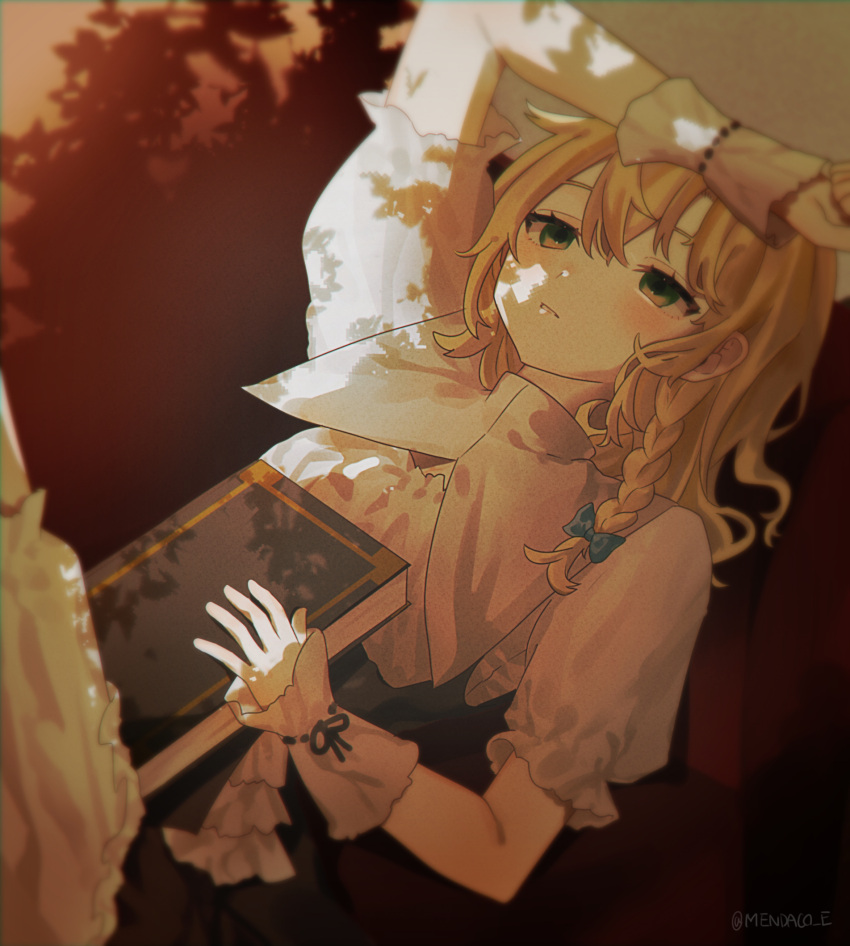 1girl apron black_vest blonde_hair blue_bow blush book bow braid collar commentary_request couch dappled_sunlight green_eyes hair_between_eyes hair_bow hand_on_forehead hand_up highres holding holding_book kirisame_marisa looking_up lying medium_hair mendako_(mendaco_e) no_headwear on_back on_couch parted_lips puffy_short_sleeves puffy_sleeves shirt short_sleeves single_braid solo sunlight touhou twitter_username upper_body vest waist_apron white_apron white_collar white_shirt wrist_cuffs