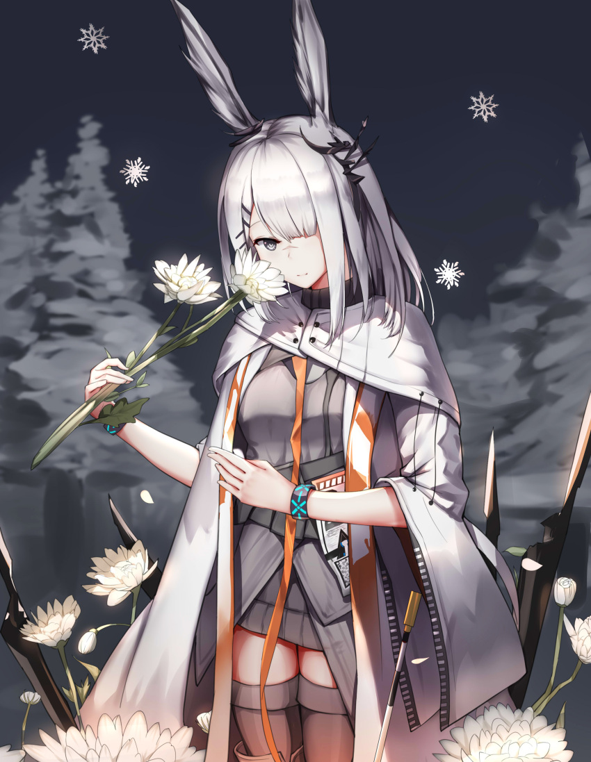 1girl absurdres arknights black_hair black_shirt black_skirt coat cowboy_shot cyanide-whale ear_ornament flower frostnova_(arknights) grey_eyes grey_hair hair_over_one_eye hands_up highres holding holding_flower infection_monitor_(arknights) looking_at_viewer outdoors scar scar_across_eye scar_on_face scar_on_nose shirt skirt smile snowflakes solo tree white_coat white_flower wide_sleeves