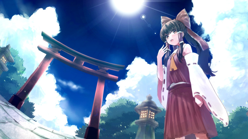1girl arm_up ascot bangs black_hair blue_sky blush bow brown_eyes buruxugi clouds cloudy_sky commentary detached_sleeves dutch_angle frilled_hair_tubes frills hair_ornament hair_tubes hakurei_reimu highres japanese_clothes long_hair long_skirt long_sleeves miko nature open_mouth outdoors ponytail red_bow red_skirt ribbon-trimmed_sleeves ribbon_trim shirt sidelocks skirt sky sleeveless sleeveless_shirt solo sunlight torii touhou tree white_sleeves yellow_ascot