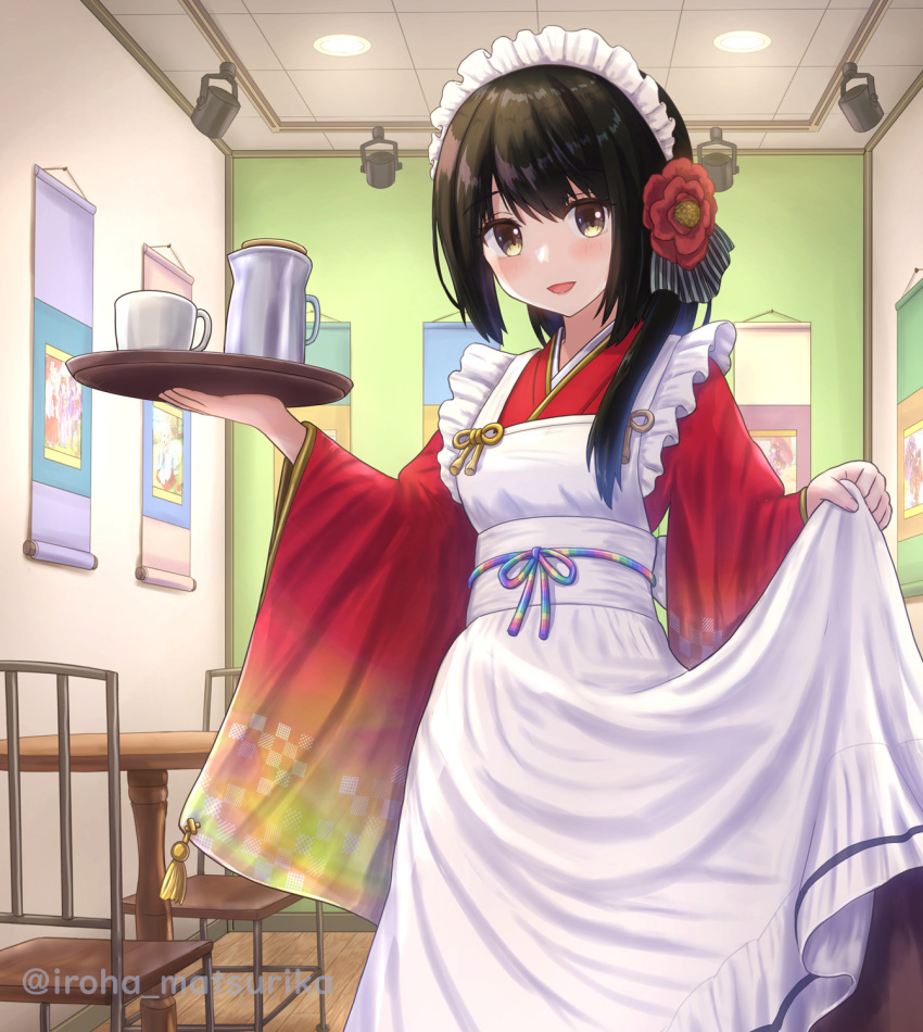 1girl :d apron bangs black_hair brown_eyes brown_skirt chain commentary_request cup flower frilled_apron frills hair_flower hair_ornament highres holding holding_tray indoors iroha_(iroha_matsurika) japanese_clothes kimono long_hair long_sleeves looking_at_viewer maid_headdress original red_flower red_kimono skirt smile solo table tray twitter_username wa_maid white_apron wide_sleeves
