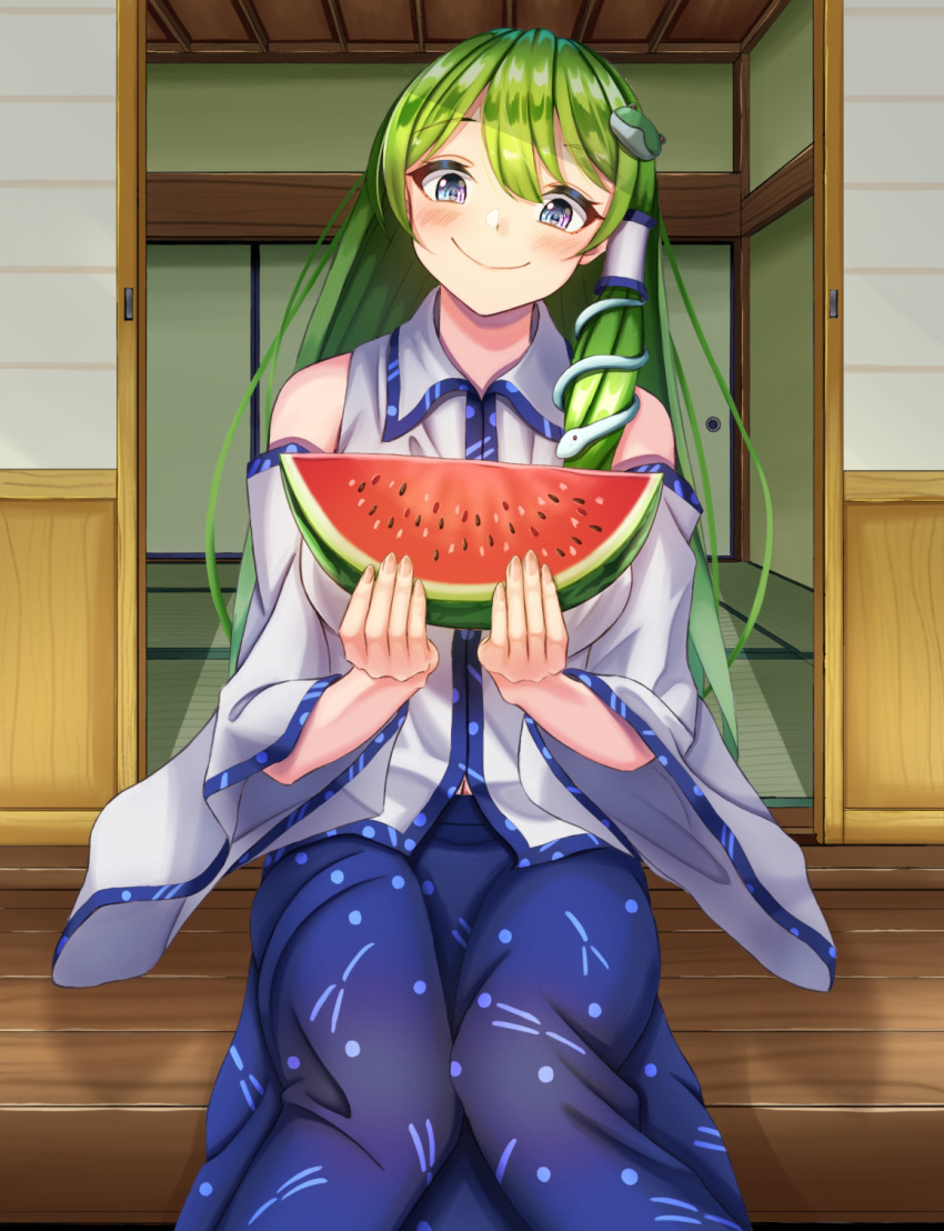 1girl bangs bare_shoulders blue_skirt closed_mouth collared_shirt detached_sleeves food frog_hair_ornament fruit green_hair grey_eyes hair_ornament hair_tubes highres holding holding_food kochiya_sanae long_hair looking_at_viewer meguri39 nontraditional_miko outdoors shirt shrine sitting skirt smile snake_hair_ornament solo touhou watermelon watermelon_slice white_shirt wide_sleeves