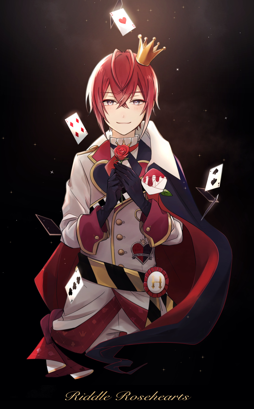 1pinpon absurdres antenna_hair bangs blue_eyes blush cape card character_name crown flower gloves gold_trim highres holding holding_flower jacket long_sleeves looking_at_viewer male_focus mini_crown neck_flower neck_ribbon own_hands_together patch playing_card redhead ribbon riddle_rosehearts rose sash short_hair sleeve_cuffs smile solo straight-on tilted_headwear twisted_wonderland