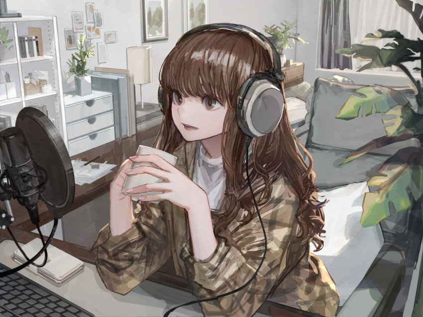 1girl absurdres brown_eyes brown_hair cup elbows_on_table hashimoto_kokai headphones highres holding holding_cup indoors keyboard_(computer) long_hair microphone mug official_art open_mouth original plaid plaid_shirt plant potted_plant shirt solo table upper_body wavy_hair