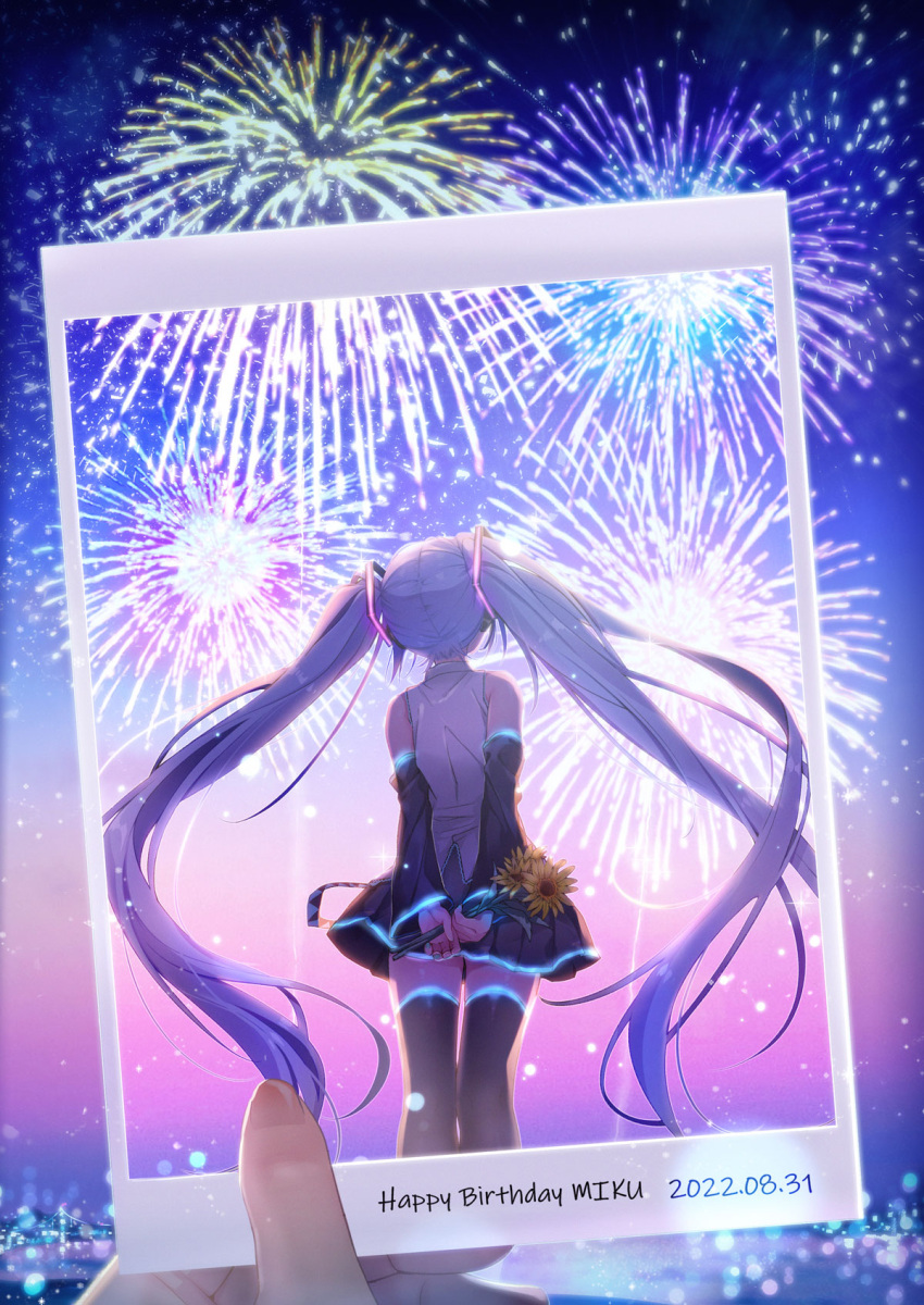 aerial_fireworks aqua_hair arms_behind_back bare_shoulders black_skirt black_sleeves black_thighhighs clear_sky commentary dated dated_commentary detached_sleeves english_commentary fireworks flower happy_birthday hatsune_miku highres holding holding_flower holding_picture legs_together long_hair looking_at_object maronie. night outdoors own_hands_together picture_(object) pleated_skirt shirt sidelocks skirt sky sleeveless sleeveless_shirt solo strap sunflower thigh-highs twintails very_long_hair vocaloid white_shirt zettai_ryouiki