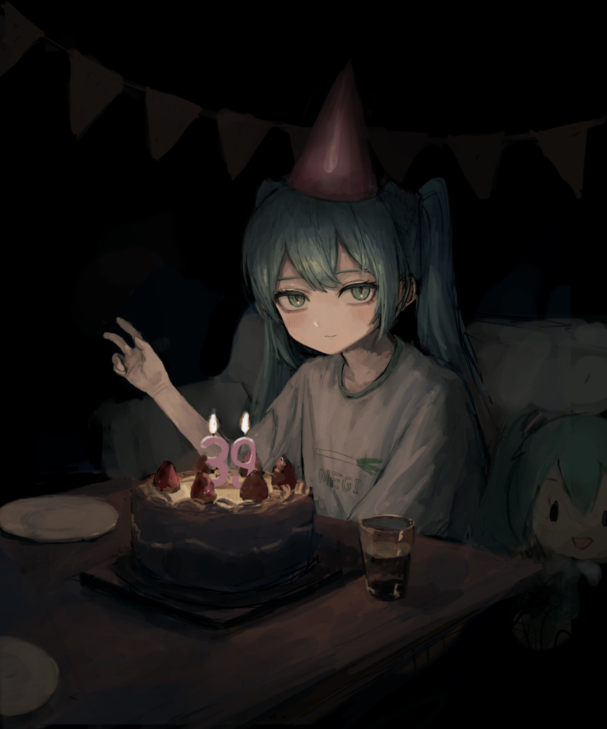 1girl absurdres alternate_costume aqua_eyes aqua_hair bangs birthday_cake birthday_party cake candle casual character_doll closed_mouth clothes_writing commentary_request cup dark drinking_glass food hat hatsune_miku highres indoors long_hair looking_at_viewer party_hat plate sakiika0513 shirt short_sleeves sitting smile solo spring_onion strawberry_cake t-shirt table twintails v vocaloid