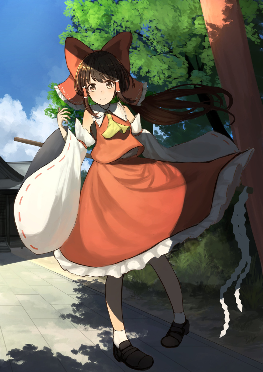 1girl absurdres ascot bangs black_footwear blue_sky bow brown_eyes brown_hair closed_mouth clouds day detached_sleeves full_body gohei hair_bow hakurei_reimu highres long_hair looking_at_viewer mittu_mittu33 nontraditional_miko outdoors red_bow red_shirt red_skirt shide shirt sidelocks skirt sky smile socks solo standing touhou tree white_socks wide_sleeves yellow_ascot