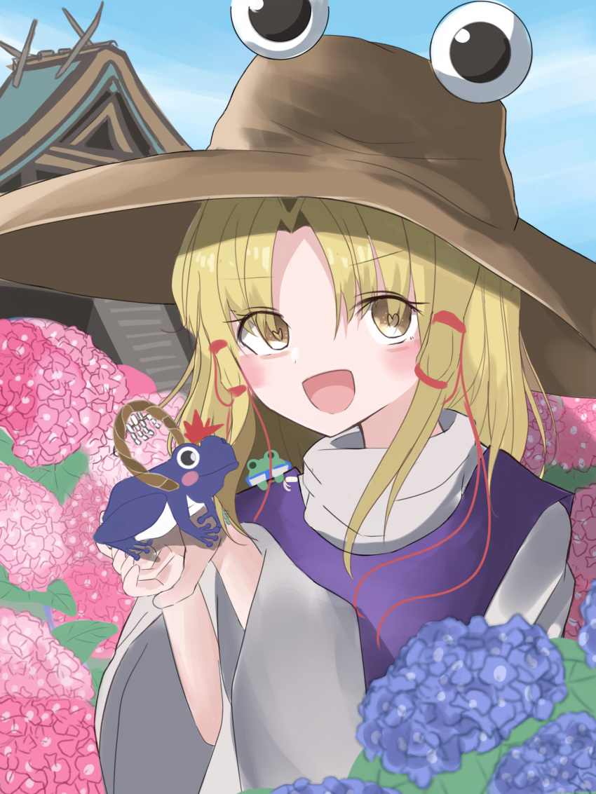 :d absurdres animal_on_hand architecture blonde_hair blue_flower blue_sky blush blush_stickers brown_headwear day east_asian_architecture flower hair_ribbon heart heart-shaped_pupils highres hydrangea large_hat long_hair long_sleeves looking_at_viewer moriya_suwako open_mouth outdoors pink_flower purple_vest red_ribbon ribbon shirt sky smile symbol-shaped_pupils touhou upper_body vest white_shirt wide_sleeves yellow_eyes yuzuki_no_kimi