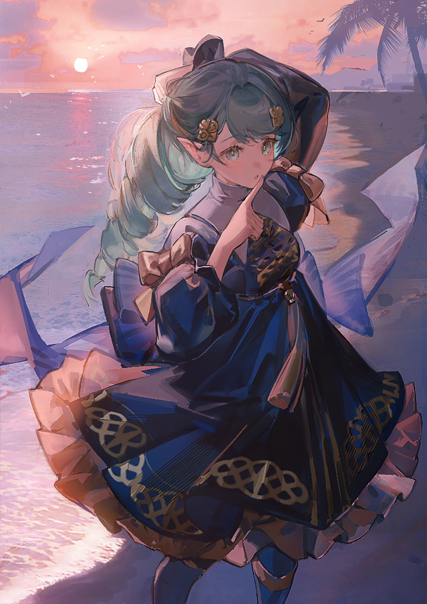 1girl absurdres animal bangs beach bird black_dress black_footwear clouds commentary dress drill_hair english_commentary fire_emblem fire_emblem:_three_houses flayn_(fire_emblem) flying green_eyes green_hair hair_ornament highres index_finger_raised long_hair looking_at_viewer neriash ocean orange_sky outdoors palm_tree pointy_ears sand sky solo sun swept_bangs tree water