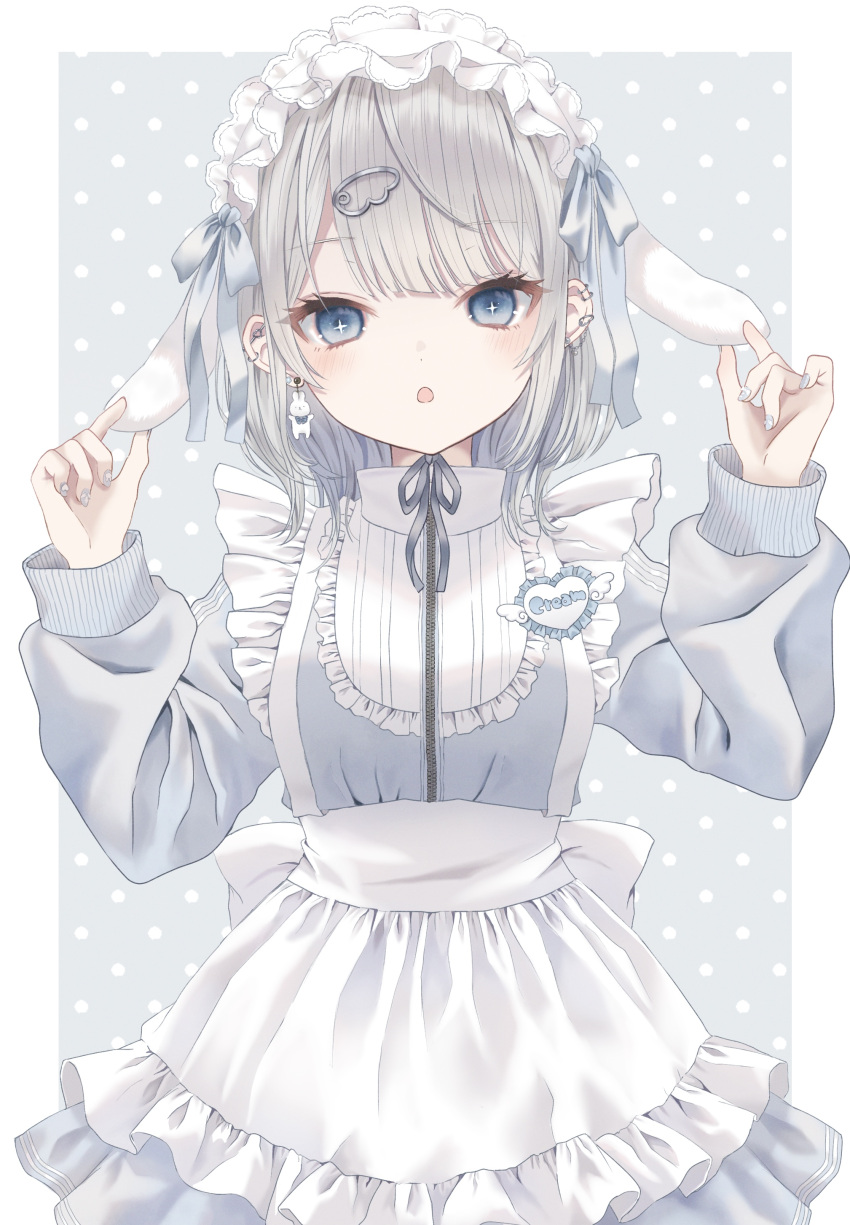 1girl :o absurdres animal_ears apron badge bangs blue_eyes blunt_bangs border breasts bunny_earrings clothes_writing collared_dress cross-shaped_pupils dot_nose dress ear_piercing earrings english_text frills grey_dress grey_hair grey_nails hands_up highres jewelry long_sleeves looking_at_viewer maid maid_apron maid_headdress nail_polish neck_ribbon original parted_lips paruno piercing polka_dot polka_dot_background rabbit_ears ribbon short_hair solo straight-on white_apron white_border zipper