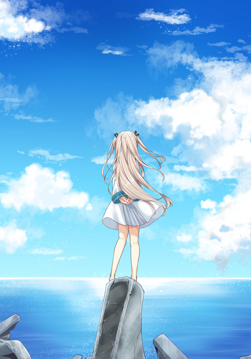 1girl absurdres arms_behind_back atri atri-my_dear_moments- barefoot black_ribbon blue_sky brown_hair clouds cloudy_sky commentary_request dress facing_away from_behind hair_ribbon highres horizon jako_(jakoo21) long_hair ocean outdoors pleated_dress ribbon sky solo standing two_side_up very_long_hair water white_dress