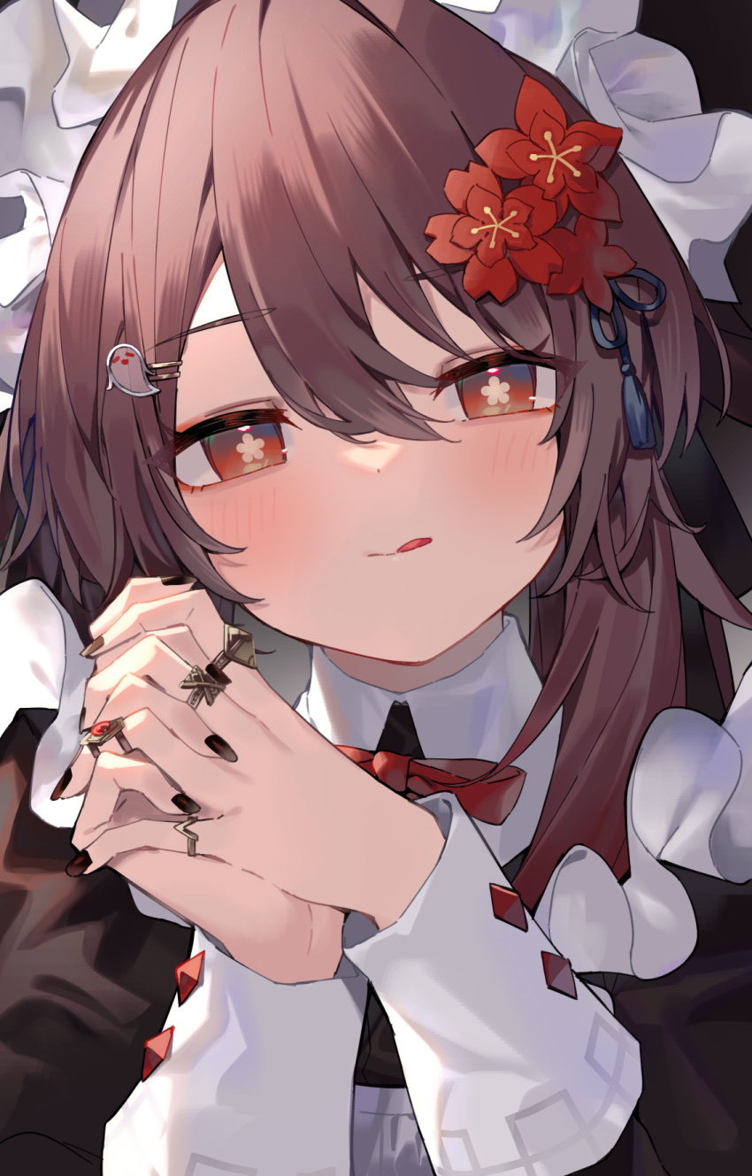 1girl :q alternate_costume apron bangs black_dress black_nails brown_hair buttons closed_mouth diamond_button dress enmaided flower flower-shaped_pupils genshin_impact ghost_hair_ornament hair_between_eyes hair_ornament hairpin highres hu_tao_(genshin_impact) jewelry kanase_(mcbrwn18) long_sleeves looking_at_viewer maid maid_apron maid_headdress multiple_rings neck_ribbon own_hands_together plum_blossoms red_eyes red_ribbon ribbon ring solo symbol-shaped_pupils tassel tongue tongue_out upper_body white_apron