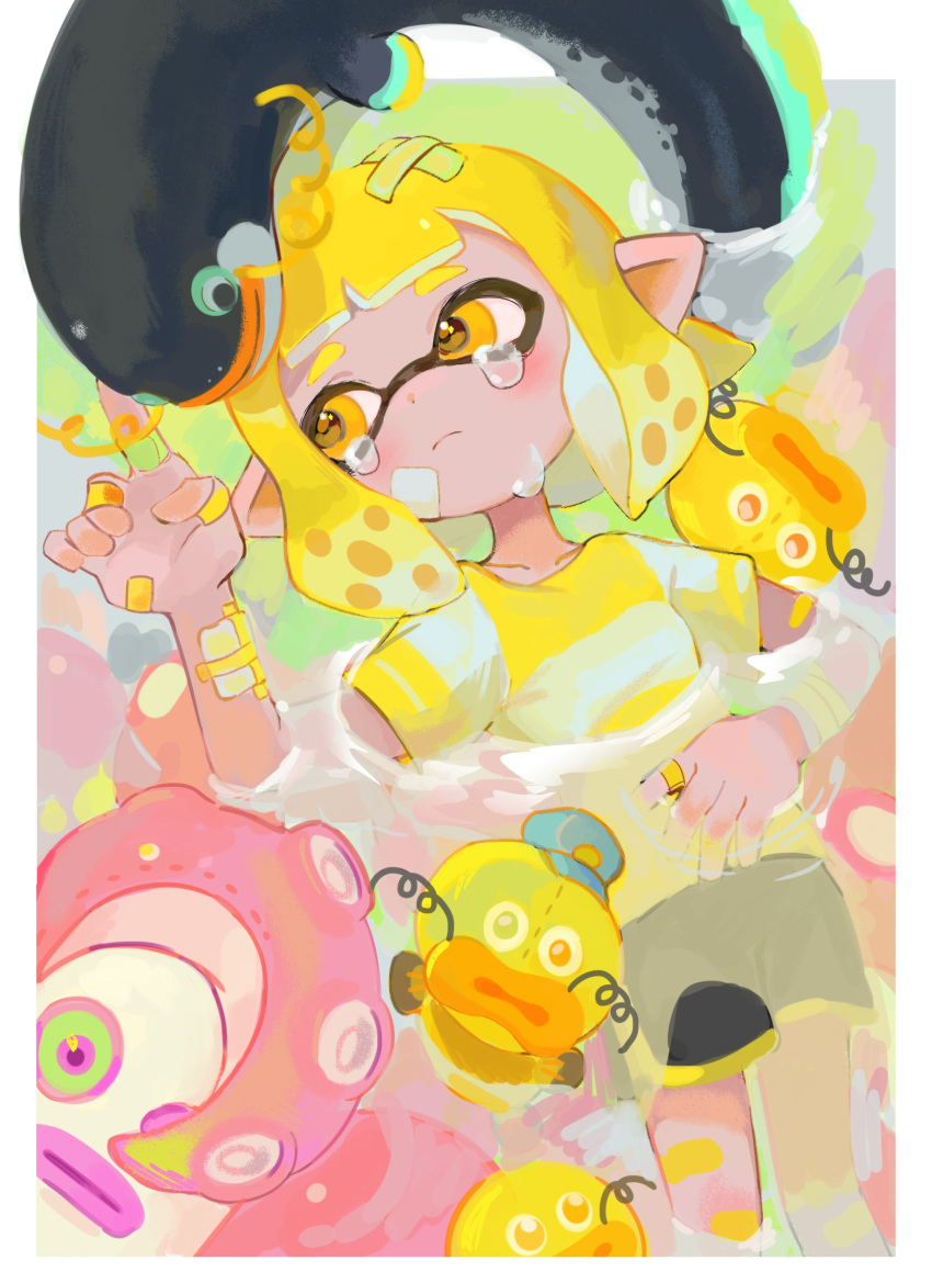 1girl animal bandaid bandaid_on_arm bangs black_shorts blonde_hair closed_mouth crying eel highres inkling inkling_girl kumo_(kumo_hsc0216) octarian octotrooper orange_eyes partially_submerged pointy_ears shirt short_hair shorts splatoon_(series) splatoon_2 stuffed_animal stuffed_toy tears tentacle_hair tentacles water yellow_shirt zapfish