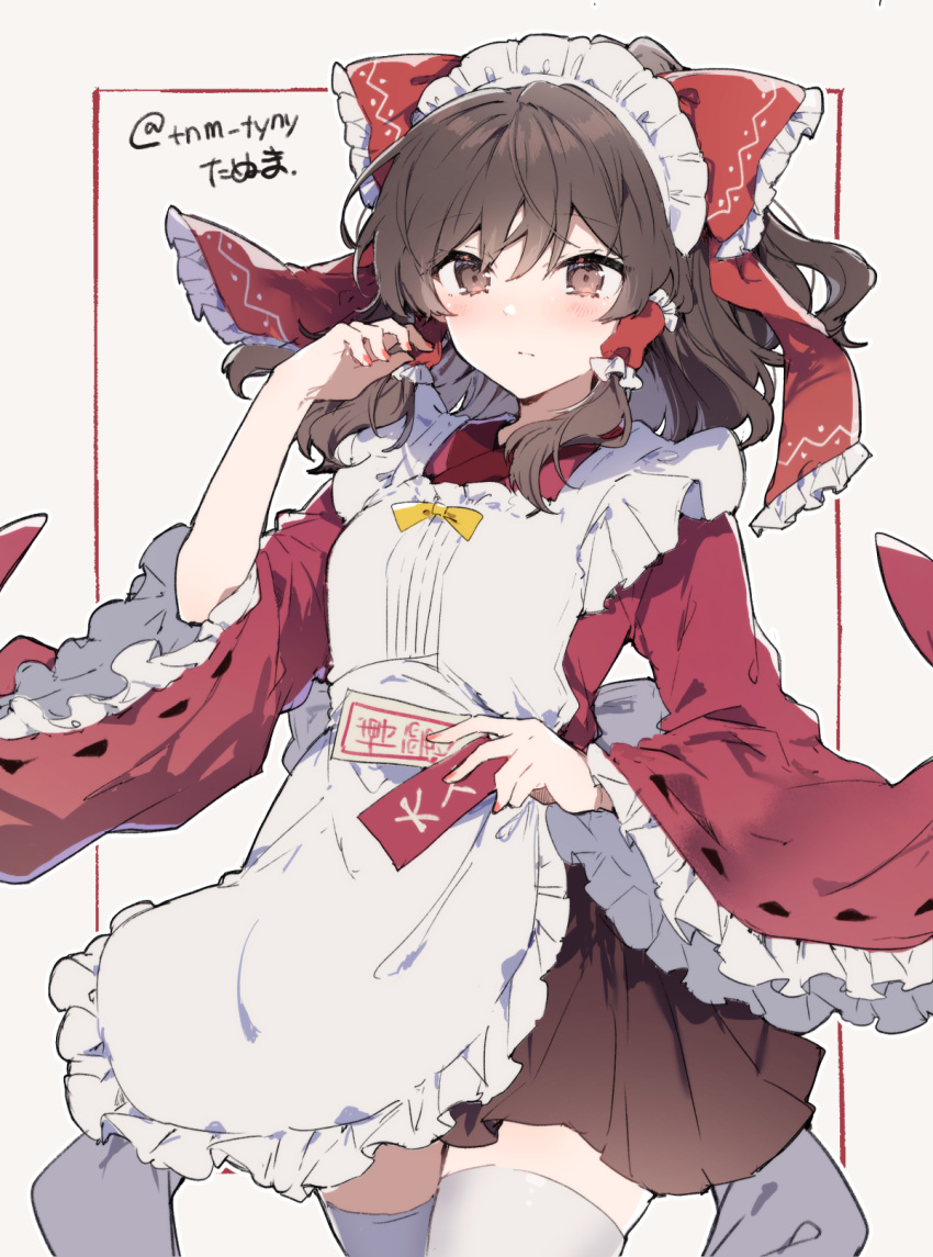 1girl alternate_costume apron bow brown_eyes brown_hair enmaided frilled_bow frills hair_bow hair_tubes hakurei_reimu highres ikeuchi_tanuma looking_at_viewer maid ofuda red_bow skirt solo thigh-highs touhou wide_sleeves