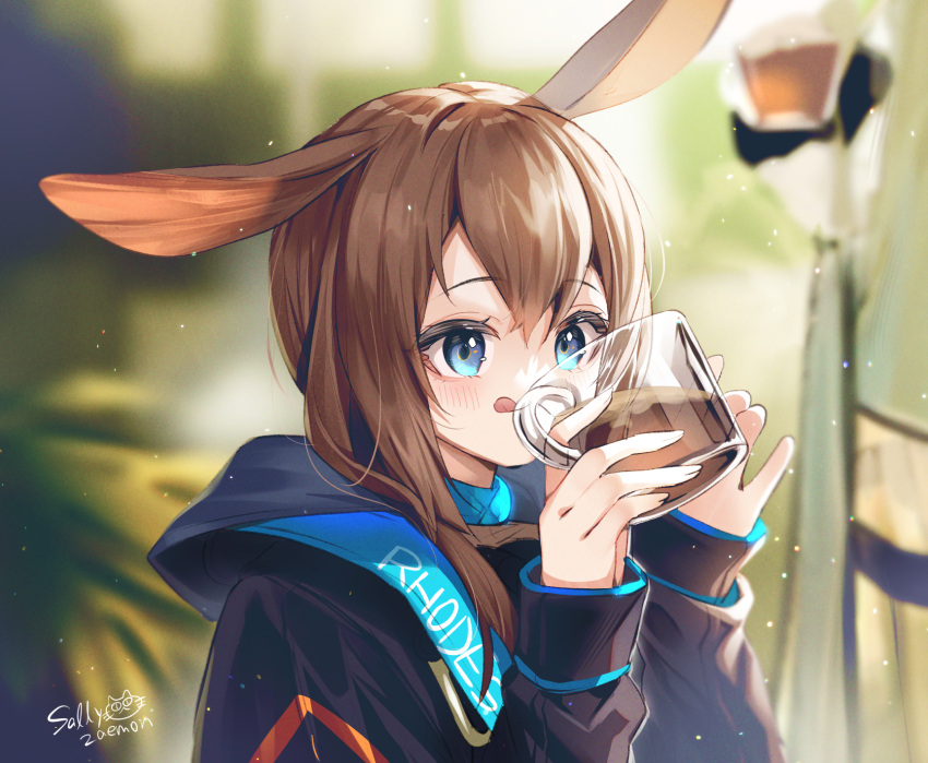 1girl amiya_(arknights) animal_ears arknights bangs black_jacket blue_eyes blurry blurry_background blush brown_hair closed_mouth commentary_request cup depth_of_field drink hair_between_eyes hands_up highres holding holding_cup hood hood_down hooded jacket long_hair long_sleeves looking_away puffy_long_sleeves puffy_sleeves rabbit_ears sallyzaemon signature sleeves_past_wrists solo tongue tongue_out transparent upper_body