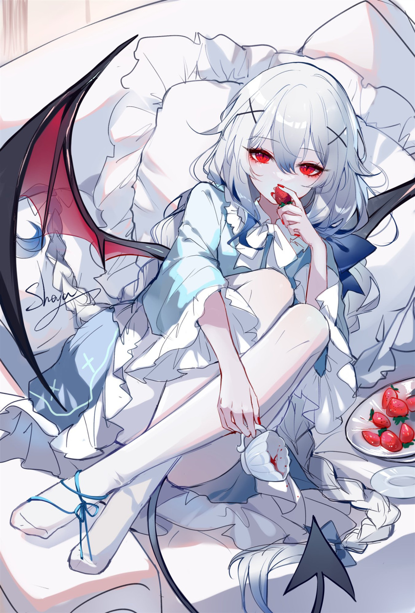 1girl bangs bat_wings blue_shirt braid braided_ponytail commentary cup demon_tail demon_wings eyelashes food frilled_sleeves frills fruit hair_between_eyes hair_ornament hand_up highres holding holding_cup long_braid long_hair long_sleeves looking_at_viewer original pillow plate pointy_ears red_eyes red_nails sheya shirt slit_pupils solo strawberry symbol-only_commentary tail teacup very_long_hair white_hair wide_sleeves wings x_hair_ornament