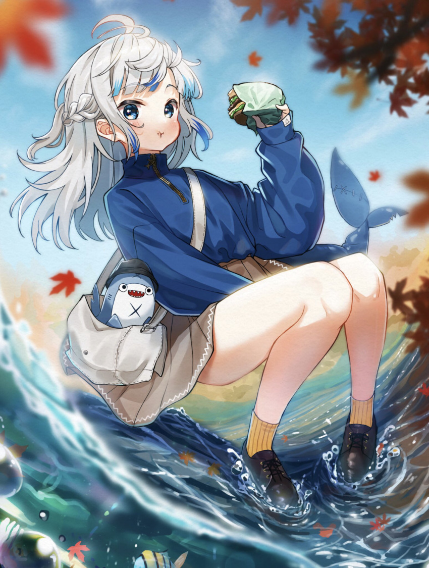 1girl ahoge alternate_costume alternate_hairstyle autumn autumn_leaves bag bangs black_footwear bloop_(gawr_gura) blue_hair blue_sweater blush braid brown_skirt burger chewing closed_mouth commentary_request falling_leaves fish_tail food food_on_face french_braid full_body gawr_gura grey_hair handbag highres hololive hololive_english knees_together_feet_apart leaf long_sleeves looking_at_viewer multicolored_hair pleated_skirt shark_tail skirt sleeves_past_wrists socks solo streaked_hair sweater tail turtleneck turtleneck_sweater virtual_youtuber water waves yellow_socks zipper zumi6