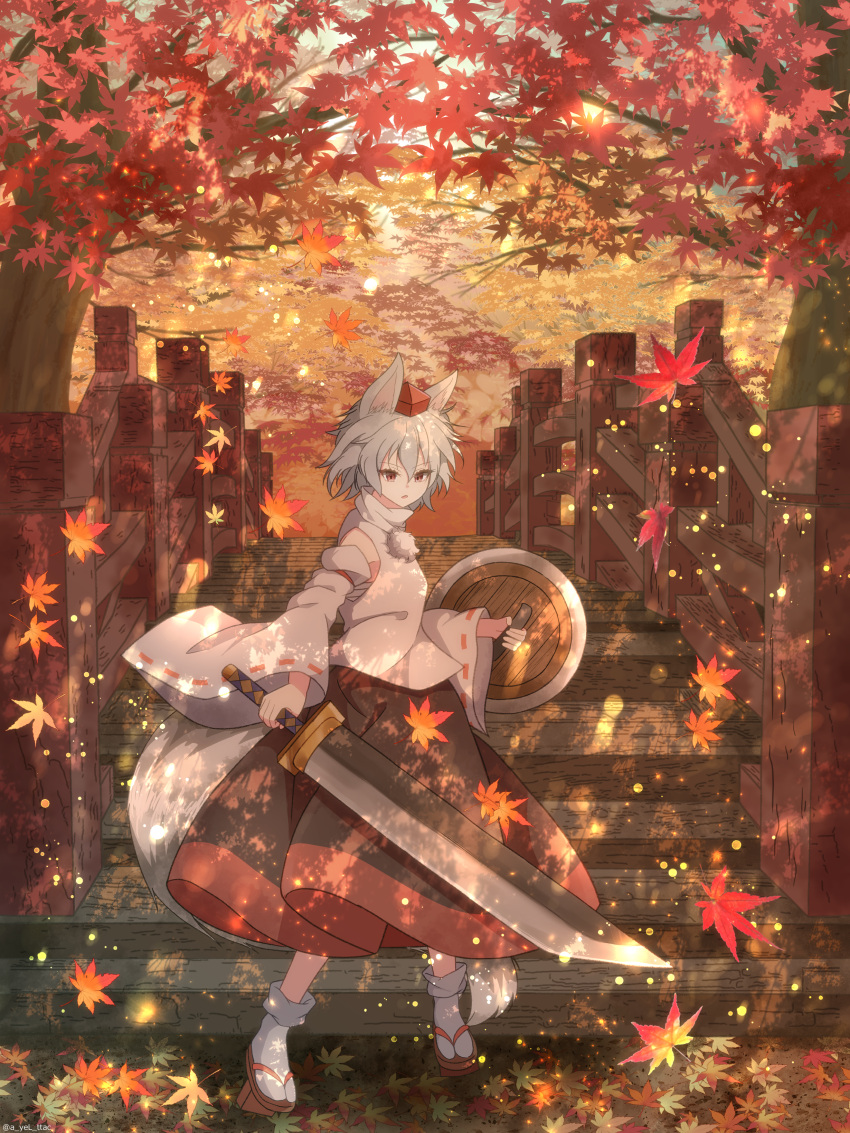 1girl :o absurdres animal_ears autumn_leaves black_socks bridge cattleya_(a_yel_ttac) commentary detached_sleeves falling_leaves forest full_body geta grey_hair hair_between_eyes hat highres holding holding_shield holding_sword holding_weapon inubashiri_momiji leaf looking_at_viewer maple_leaf nature open_mouth outdoors pom_pom_(clothes) railing red_eyes red_footwear red_headwear ribbon-trimmed_sleeves ribbon_trim sarashi shield shirt short_hair sleeveless sleeveless_shirt socks solo sword tail tengu-geta tokin_hat touhou v-shaped_eyebrows weapon white_shirt white_sleeves white_socks wide_sleeves wolf_ears wolf_girl wolf_tail
