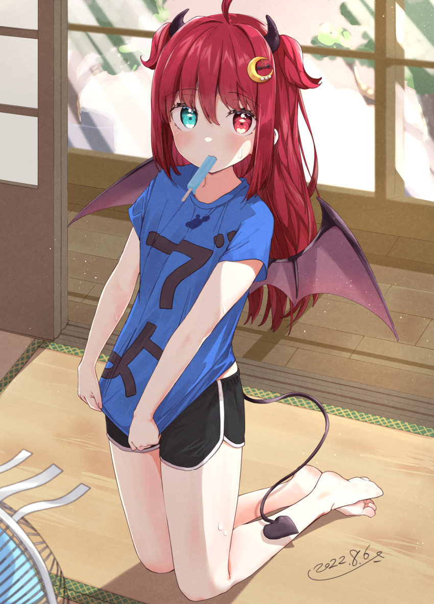 ahoge barefoot bat_wings black_shorts blue_eyes blue_shirt clothes_writing cooler crescent crescent_hair_ornament dated demon_tail hair_ornament heterochromia highres horns indoors kneeling looking_at_viewer medium_hair nijisanji popsicle_in_mouth red_eyes redhead shiisaa3 shirt shorts tail two_side_up wings yuzuki_roa
