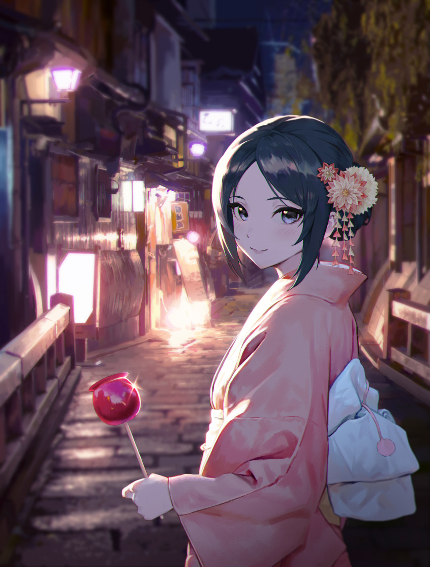 1girl absurdres bangs black_hair blush candy_apple city_lights closed_mouth commentary cowboy_shot english_commentary flower food from_side grey_eyes hair_flower hair_ornament highres holding holding_food japanese_clothes jongho_bak kimono long_sleeves looking_at_viewer medium_hair night original outdoors parted_bangs pink_flower pink_kimono sash sidelocks smile solo white_flower wide_sleeves
