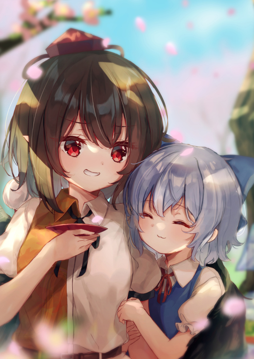 2girls :3 arm_hug black_ribbon blue_bow blue_hair blue_shirt blurry blurry_background blush bow branch brown_hair cherry_blossoms cirno closed_eyes closed_mouth collared_shirt commentary cup falling_petals grin hair_between_eyes hair_bow hat height_difference highres holding holding_cup hug kutabiretainu looking_at_another medium_hair multiple_girls mutual_hug neck_ribbon orange_shirt petals pom_pom_(clothes) puffy_short_sleeves puffy_sleeves red_eyes red_headwear red_ribbon ribbon sakazuki shameimaru_aya shirt short_sleeves smile tokin_hat touhou two-tone_shirt white_shirt wing_hug wings