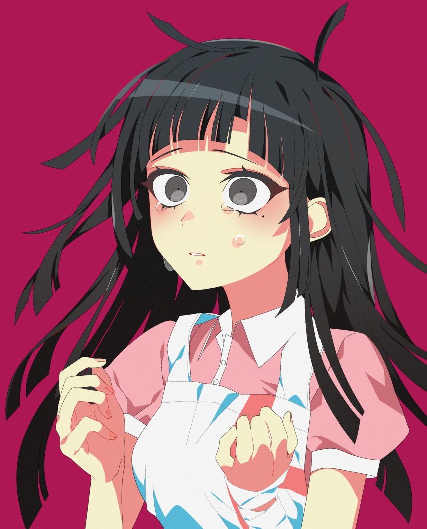 1girl apron arare_(op_ed_000) bandaged_arm bandages bangs black_eyes black_hair blush brown_eyes buttons collared_shirt commentary_request danganronpa_(series) danganronpa_2:_goodbye_despair dress_shirt hands_up highres long_hair messy_hair mole mole_under_eye parted_lips pink_shirt puffy_short_sleeves puffy_sleeves red_background shiny shiny_hair shirt short_sleeves simple_background solo tears teeth tsumiki_mikan white_apron