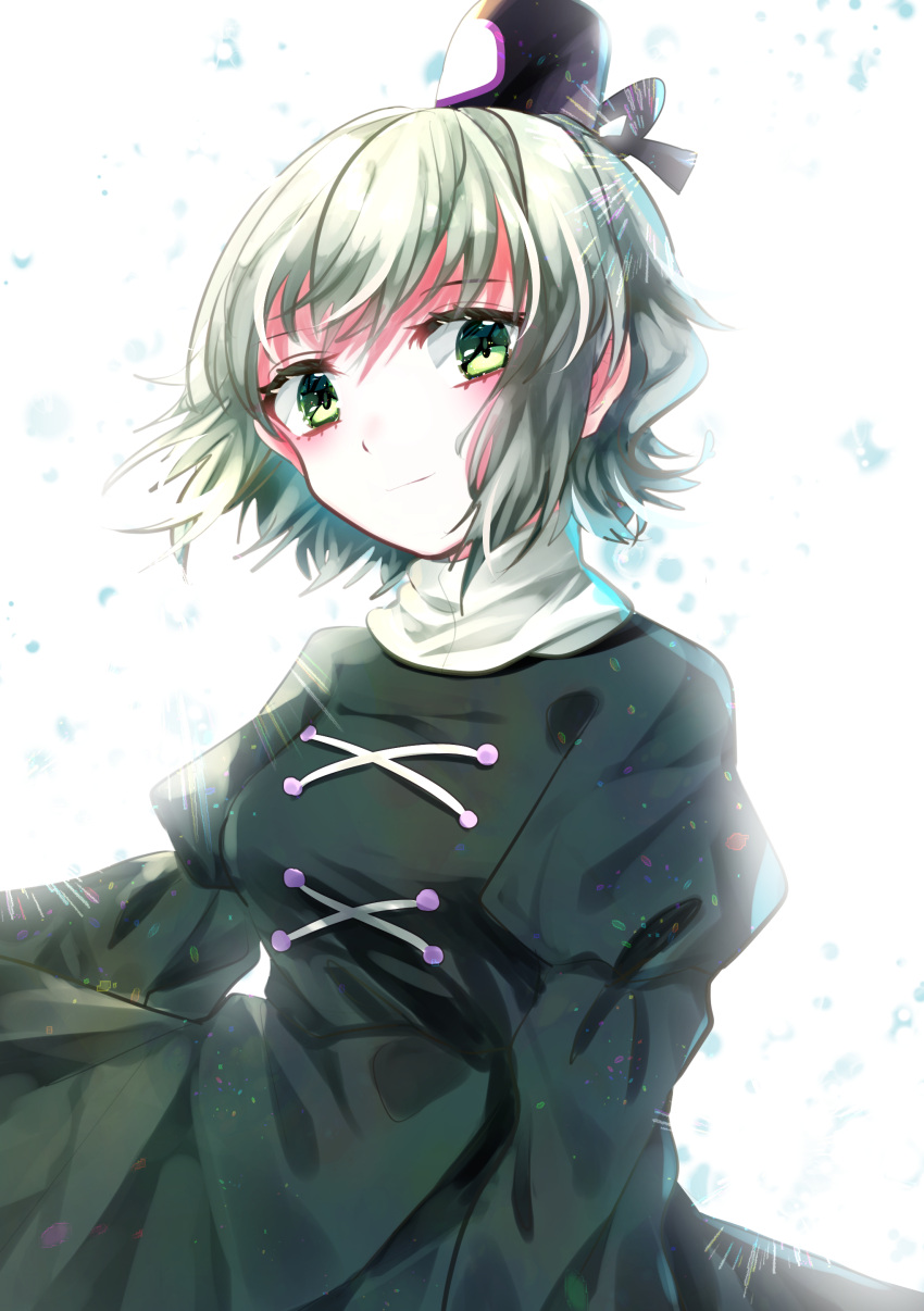 1girl absurdres bangs black_headwear closed_mouth cross-laced_clothes dress green_dress green_eyes green_hair hat highres juliet_sleeves long_sleeves looking_at_viewer puffy_sleeves short_hair simple_background soga_no_tojiko solo soraki_(marisa_syou) tate_eboshi touhou upper_body white_background
