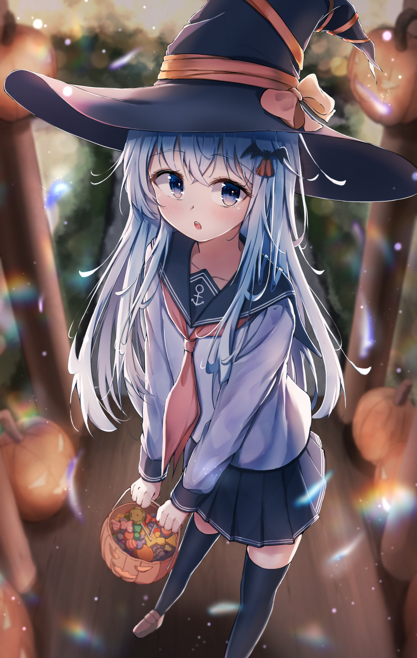 1girl absurdres anchor_symbol basket black_headwear black_sailor_collar black_skirt black_thighhighs blue_eyes blurry blurry_background blush brown_footwear candy dfd food hair_between_eyes halloween halloween_costume hat hibiki_(kancolle) highres holding holding_basket jack-o'-lantern kantai_collection lollipop long_hair long_sleeves looking_at_viewer neckerchief open_mouth pleated_skirt red_neckerchief sailor_collar school_uniform serafuku shoes skirt solo thigh-highs white_hair witch_hat