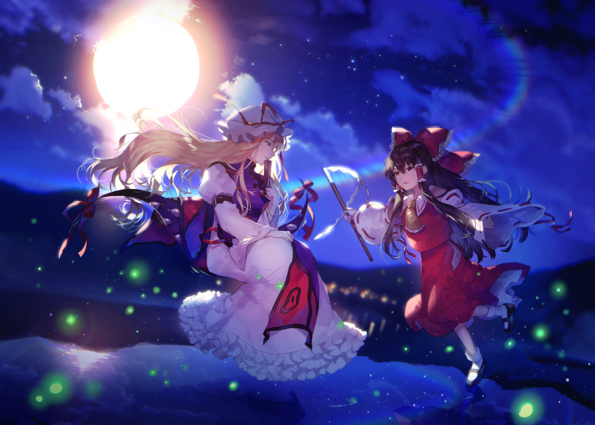 2girls ascot black_footwear blonde_hair bow brown_eyes brown_hair clouds commentary detached_sleeves dress fireflies floating floating_hair folded_fan folding_fan frilled_bow frilled_hair_tubes frills full_moon gap_(touhou) gohei hair_between_eyes hair_bow hair_tubes hakurei_reimu hand_fan hat hat_ribbon highres holding holding_fan holding_gohei long_hair long_sleeves looking_at_another mary_janes mob_cap moon multiple_girls night night_sky open_mouth outdoors parted_lips purple_tabard red_bow red_ribbon red_skirt red_vest ribbon ribbon-trimmed_sleeves ribbon_trim shoes sidelocks skirt skirt_set sky sleeve_garter smile socks star_(sky) starry_sky sunakumo tabard touhou very_long_hair vest white_dress white_headwear white_sleeves white_socks wide_sleeves yakumo_yukari yellow_ascot yellow_eyes