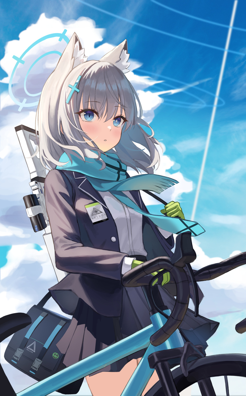 1girl absurdres animal_ear_fluff animal_ears assault_rifle bag bangs bicycle blue_archive blue_eyes blue_jacket blue_scarf blush breast_pocket cat_ears cat_tail cloud cross_hair_ornament day extra_ears gloves green_gloves grey_hair ground_vehicle gun hair_ornament halo highres holding id_card jacket long_sleeves looking_at_viewer medium_hair mismatched_pupils necktie open_clothes open_jacket outdoors plaid plaid_skirt pleated_skirt pocket rahy rifle scarf school_bag school_uniform shiroko_(blue_archive) shirt skirt sky solo striped striped_scarf tail weapon white_shirt wolf_ears