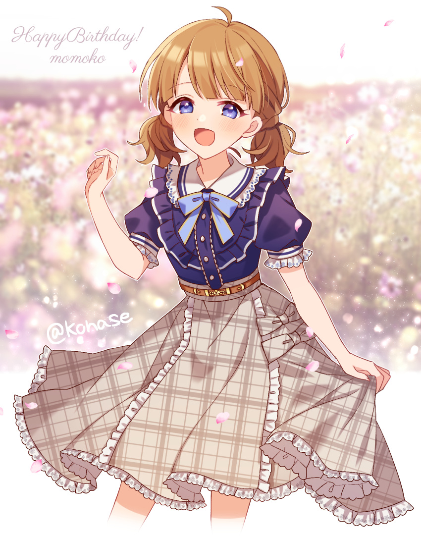 1girl ahoge bangs belted_skirt blue_bow blue_bowtie blue_shirt blurry blurry_background blush border bow bowtie brown_hair brown_skirt buttons character_name checkered_clothes checkered_skirt collar commentary falling_petals female_child floral_background frilled_collar frilled_shirt frilled_skirt frilled_sleeves frills hand_up happy_birthday highres idolmaster idolmaster_million_live! idolmaster_million_live!_theater_days konase_(non_stop!) looking_at_viewer official_alternate_costume official_alternate_hairstyle open_mouth petals plaid plaid_skirt puffy_short_sleeves puffy_sleeves shirt short_hair short_sleeves short_twintails skirt smile solo suou_momoko twintails twitter_username white_border white_collar