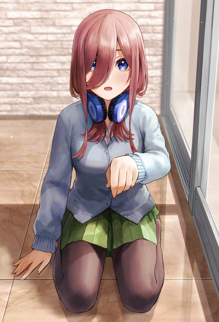 1girl blue_cardigan blue_eyes brown_hair cardigan collared_shirt commentary_request go-toubun_no_hanayome green_skirt hair_between_eyes headphones headphones_around_neck highres indoors ishiyuki long_hair long_sleeves looking_at_viewer nakano_miku open_mouth pleated_skirt quintuplets reflection school_uniform seiza shadow shirt sidelocks sitting skirt solo tile_floor tiles white_shirt