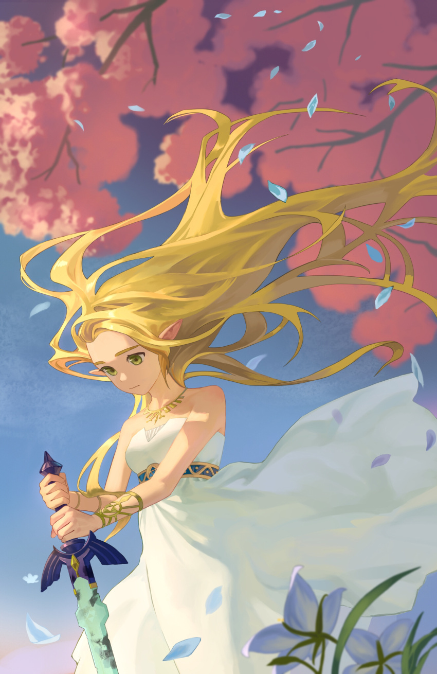 1girl bare_shoulders blonde_hair blue_flower blue_sky bracelet closed_mouth day dress floating_hair flower green_eyes highres holding holding_sword holding_weapon jewelry long_hair looking_down master_sword necklace outdoors petals phina_(jinahou) princess_zelda sky solo strapless strapless_dress sword the_legend_of_zelda tree underbust very_long_hair weapon white_dress wind