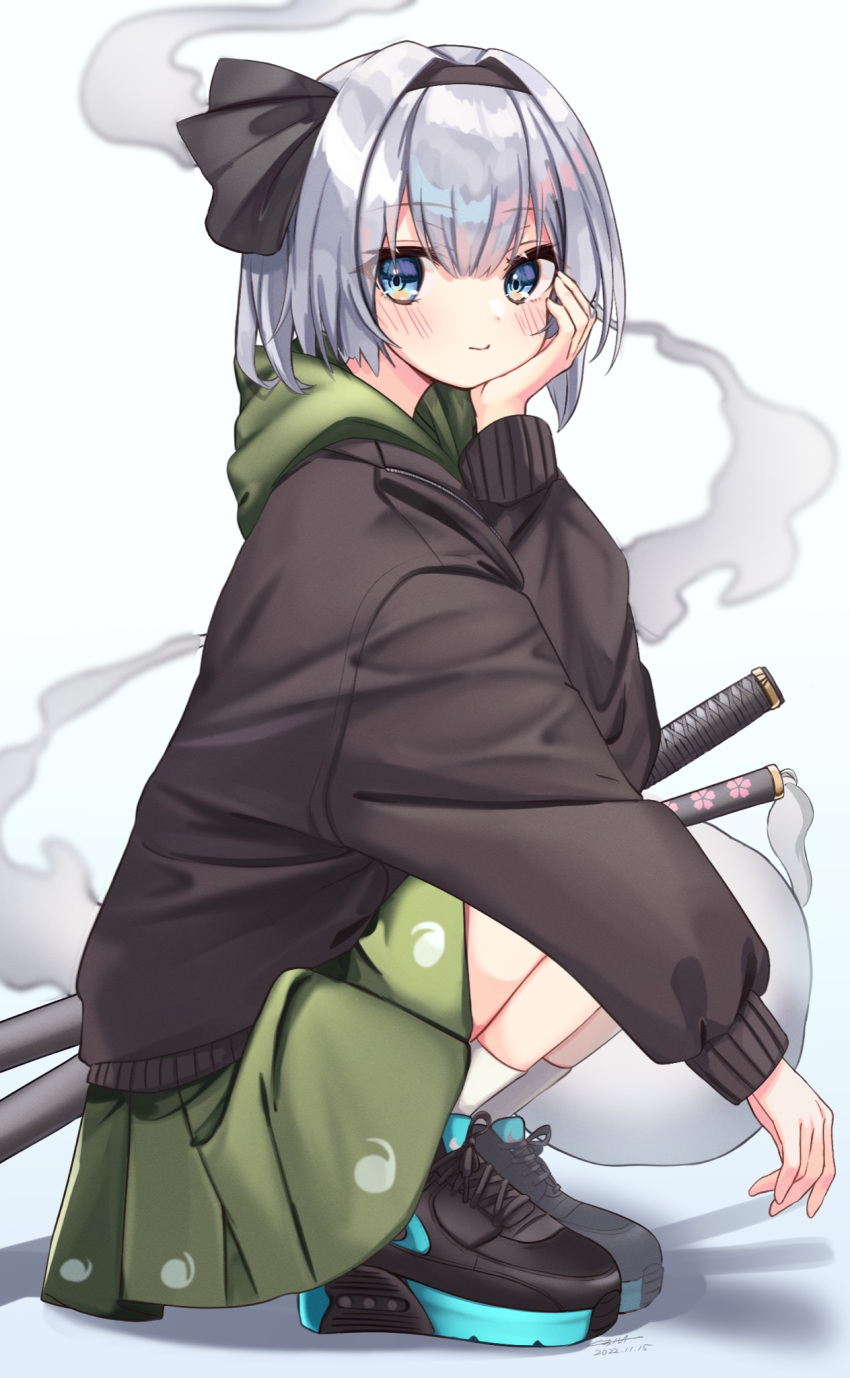 1girl alternate_costume black_footwear black_hairband black_hoodie blue_eyes cheek_rest closed_mouth dress from_side full_body green_dress hairband hand_on_own_face highres hood hood_down hoodie konpaku_youmu konpaku_youmu_(ghost) looking_at_viewer shoes short_hair simple_background smile sneakers socks solo squatting touhou two-tone_footwear white_background white_hair white_socks yuineko