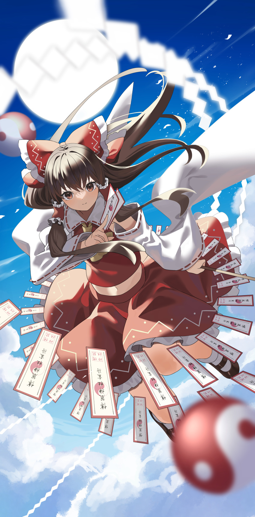 1girl above_clouds absurdres ascot between_fingers black_footwear blue_sky blurry bow brown_eyes brown_hair clouds collared_shirt depth_of_field detached_sleeves floating floating_hair frilled_bow frilled_hair_tubes frilled_skirt frills hair_bow hair_tubes hakurei_reimu hand_up highres holding knee_up long_hair looking_at_viewer mary_janes navel ofuda orb red_bow red_shirt red_skirt shide shirt shoes sidelocks skirt skirt_set sky sleeveless sleeveless_shirt solo stomach touhou yellow_ascot yin_yang yin_yang_orb yuujin_(yuzinn333)