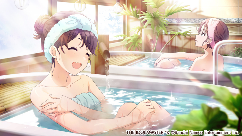 2girls asakura_toru bare_shoulders bathing bathtub black_hair closed_eyes collarbone commentary_request fangs fukumaru_koito hair_bun idolmaster idolmaster_shiny_colors light_bulb multiple_girls naked_towel official_art onsen open_mouth plant single_hair_bun skin_fangs sunlight towel towel_on_head water wet