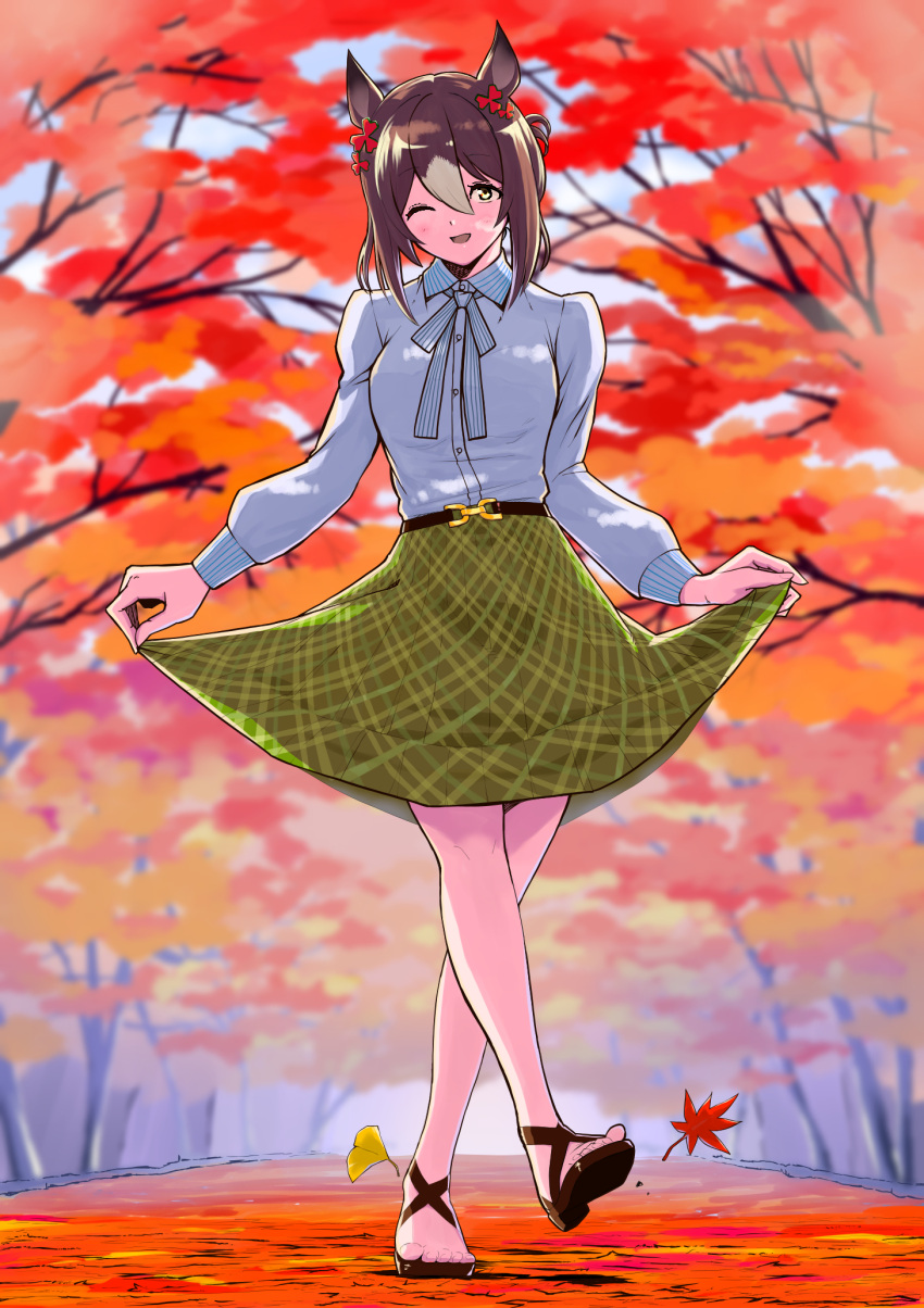 1girl ;d animal_ears autumn_leaves brown_hair clothes_lift clover_hair_ornament collared_shirt commentary_request fine_motion_(umamusume) full_body ginkgo_leaf green_skirt hair_between_eyes hair_ornament highres horse_ears horse_girl leaf lifted_by_self long_sleeves looking_at_viewer maharu66 maple_leaf multicolored_hair one_eye_closed partial_commentary sandals shirt skirt skirt_lift smile solo two-tone_hair umamusume white_hair white_shirt yellow_eyes