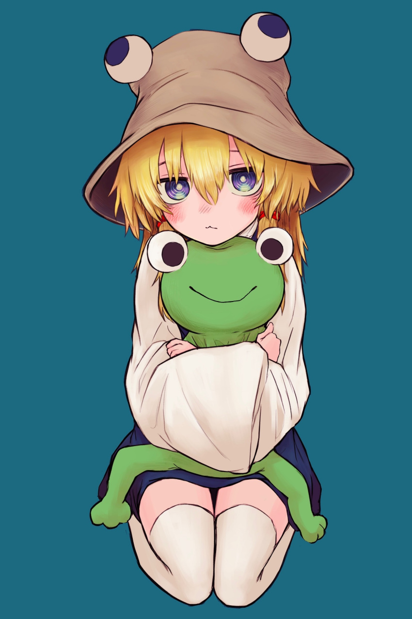 1girl blonde_hair blue_background blue_eyes bright_pupils brown_headwear closed_mouth frog full_body highres holding long_sleeves looking_at_viewer moriya_suwako neritch seiza short_hair sidelocks simple_background sitting solo thigh-highs touhou white_pupils white_thighhighs wide_sleeves