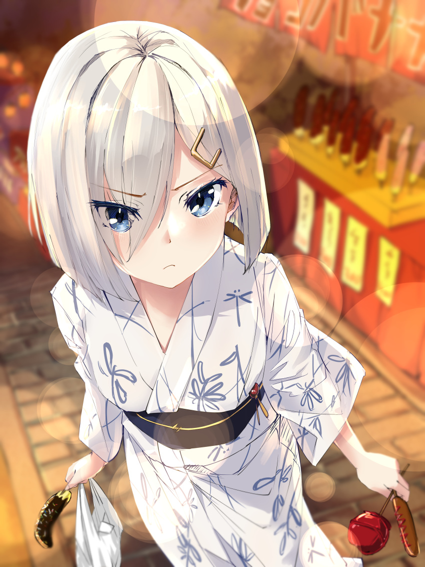 1girl absurdres bag blue_eyes blurry blurry_background breasts candy_apple chocolate_banana closed_mouth commentary_request eyes_visible_through_hair food food_stand frown grey_hair hair_ornament hair_over_one_eye hairclip hamakaze_(kancolle) highres holding holding_bag holding_food holding_skewer japanese_clothes kantai_collection kimono large_breasts looking_at_viewer night obijime official_alternate_costume short_hair skewer solo summer_festival white_kimono yamamori_oyatsu yukata