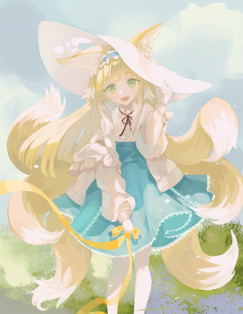 1girl :d absurdres animal_ear_fluff animal_ears arknights blue_skirt blush cardigan commentary ears_through_headwear fang feet_out_of_frame fox_ears fox_girl fox_tail green_eyes hand_on_headwear highres holding holding_ribbon lace-trimmed_skirt lace_trim long_sleeves looking_at_viewer multiple_tails mushi40384 neck_ribbon off_shoulder official_alternate_costume open_mouth red_ribbon ribbon shirt skirt smile solo suzuran_(arknights) suzuran_(spring_praise)_(arknights) tail teeth upper_teeth white_cardigan white_headwear white_shirt yellow_ribbon
