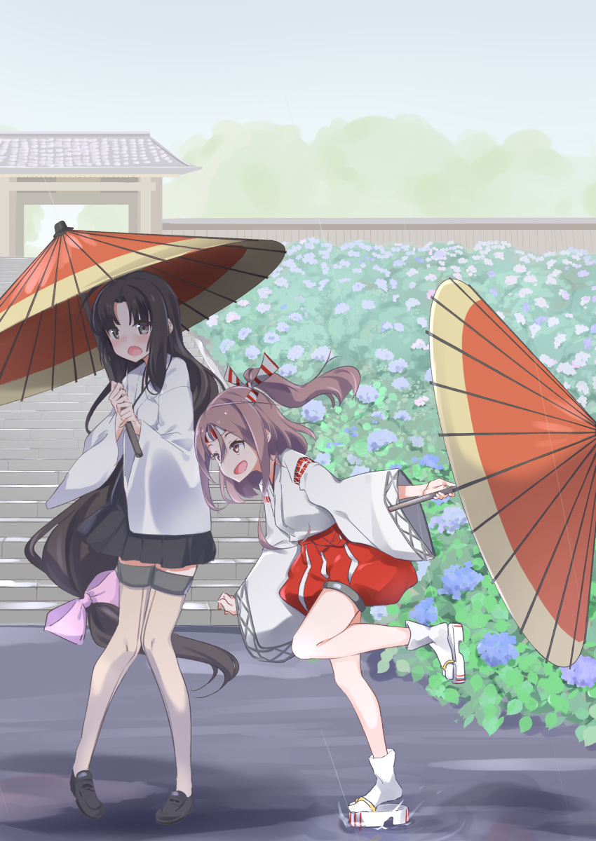 2girls absurdres ahoge black_hair black_skirt brown_eyes brown_hair geta hachimaki hakama hakama_short_skirt hakama_skirt headband high_ponytail highres holding holding_umbrella japanese_clothes kantai_collection leg_up long_hair long_sleeves low-tied_long_hair multiple_girls natsuki_(gedo) oil-paper_umbrella pleated_skirt rain shouhou_(kancolle) skirt thigh-highs umbrella wide_sleeves zuihou_(kancolle)