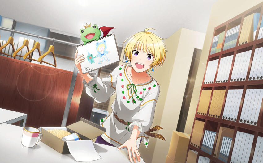 1boy ahoge animal_print bangs blonde_hair clothes_hanger collarbone cup drawing fingernails frog_print green_ribbon highres idolmaster idolmaster_side-m idolmaster_side-m_live_on_stage! indoors kaerre male_focus official_art open_mouth pierre_bichelberger ribbon smile stuffed_animal stuffed_frog stuffed_toy third-party_source violet_eyes