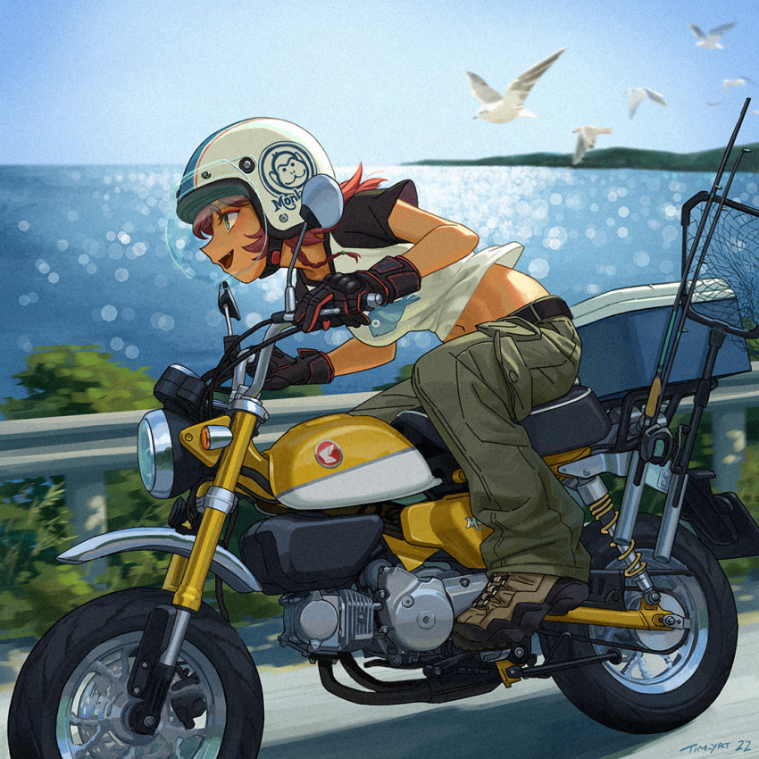 1girl blurry blurry_background cargo_pants day english_commentary fang film_grain from_side green_eyes ground_vehicle helmet long_hair motor_vehicle motorcycle ocean original outdoors pants redhead riding shirt short_sleeves solo t-shirt tim_yan