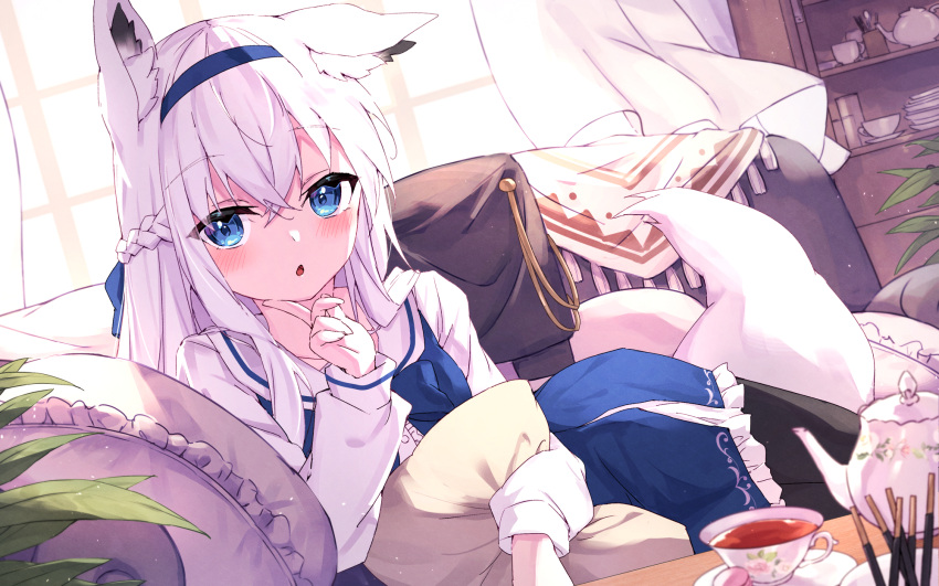 1girl :o animal_ear_fluff animal_ears backlighting bangs blue_dress blue_eyes blue_hairband blush braid center_frills commentary_request couch cup curtains dress food frills fringe_trim hair_between_eyes hairband highres indoors long_sleeves looking_at_viewer masaki_(msk064) on_couch original parted_lips pillow pocky puffy_long_sleeves puffy_sleeves sailor_collar sailor_dress sitting solo tea teacup teapot white_hair white_sailor_collar window