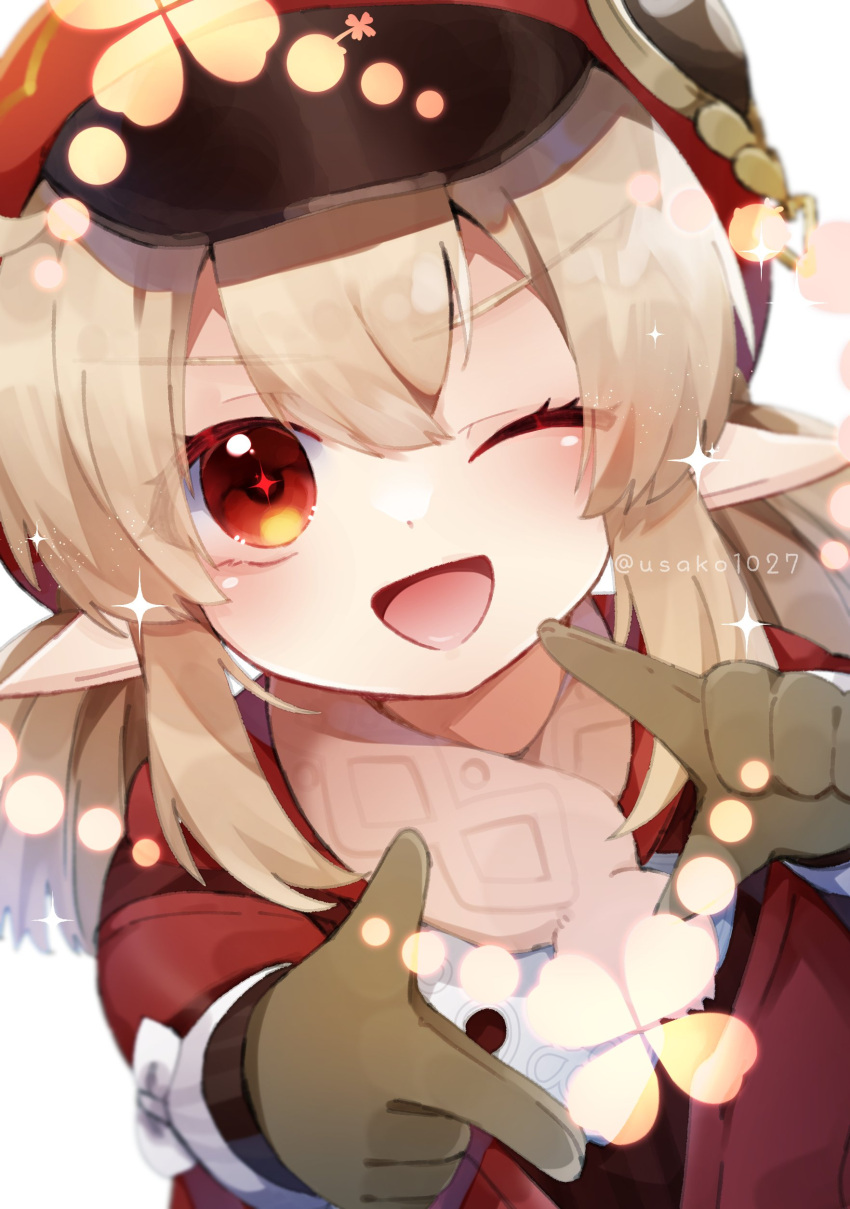 1girl absurdres brown_gloves brown_scarf cabbie_hat clover_print coat dutch_angle finger_frame genshin_impact gloves hair_between_eyes hat highres klee_(genshin_impact) light_brown_hair low_twintails medium_hair one_eye_closed open_mouth pointy_ears red_coat red_eyes red_headwear scarf sidelocks smile solo sparkle sparkling_eyes twintails twitter_username upper_body usako_(usako1031) v-shaped_eyebrows white_background