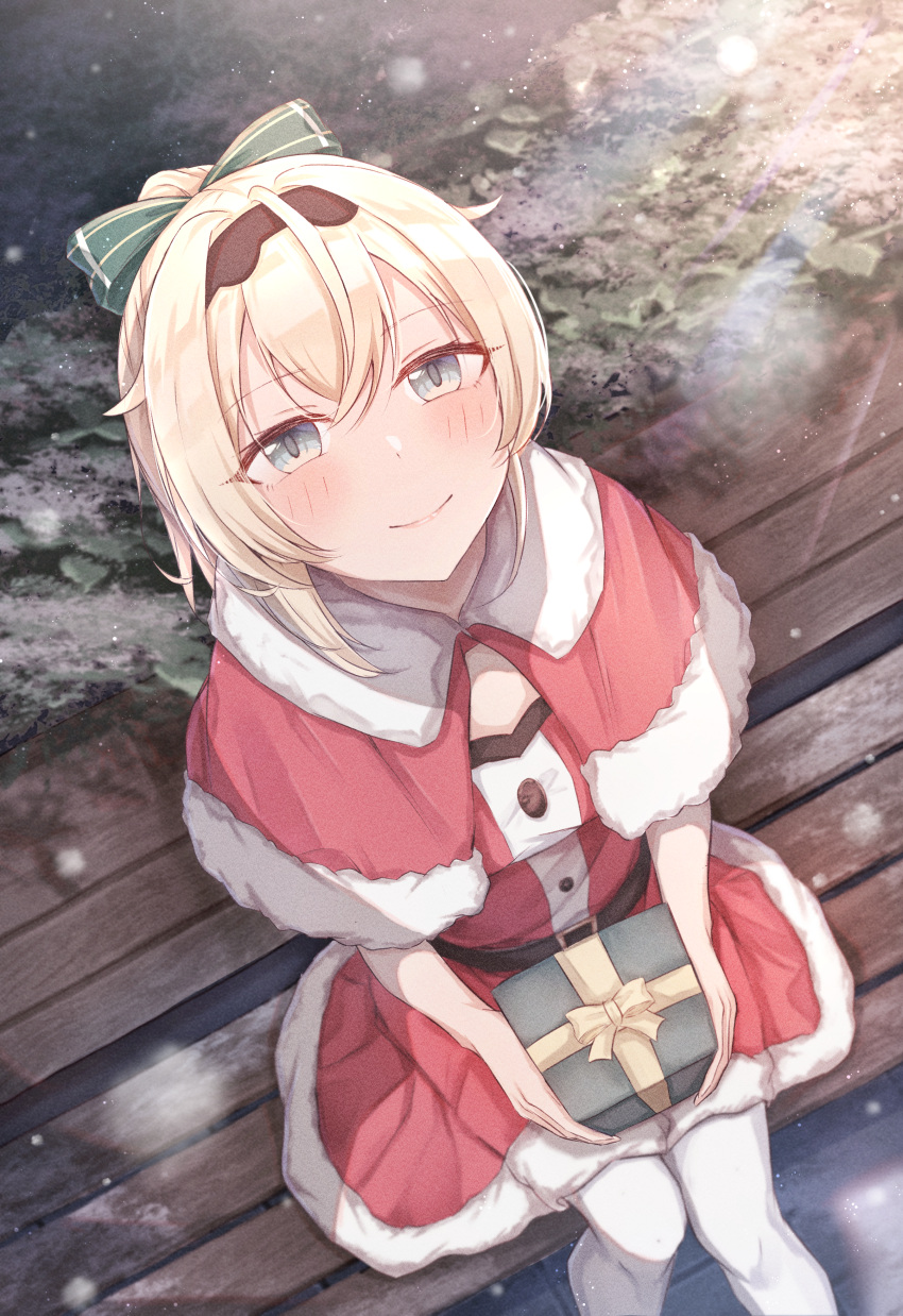 1girl absurdres belt bench black_belt blonde_hair blue_eyes blush bow box capelet ch13 christmas closed_mouth commentary_request from_above fur-trimmed_capelet fur-trimmed_skirt fur_trim gift gift_box green_bow hair_between_eyes hair_bow highres holding holding_gift hololive kazama_iroha long_hair looking_at_viewer on_bench park_bench ponytail red_capelet red_skirt santa_costume sitting skirt smile snowing solo thigh-highs virtual_youtuber white_thighhighs