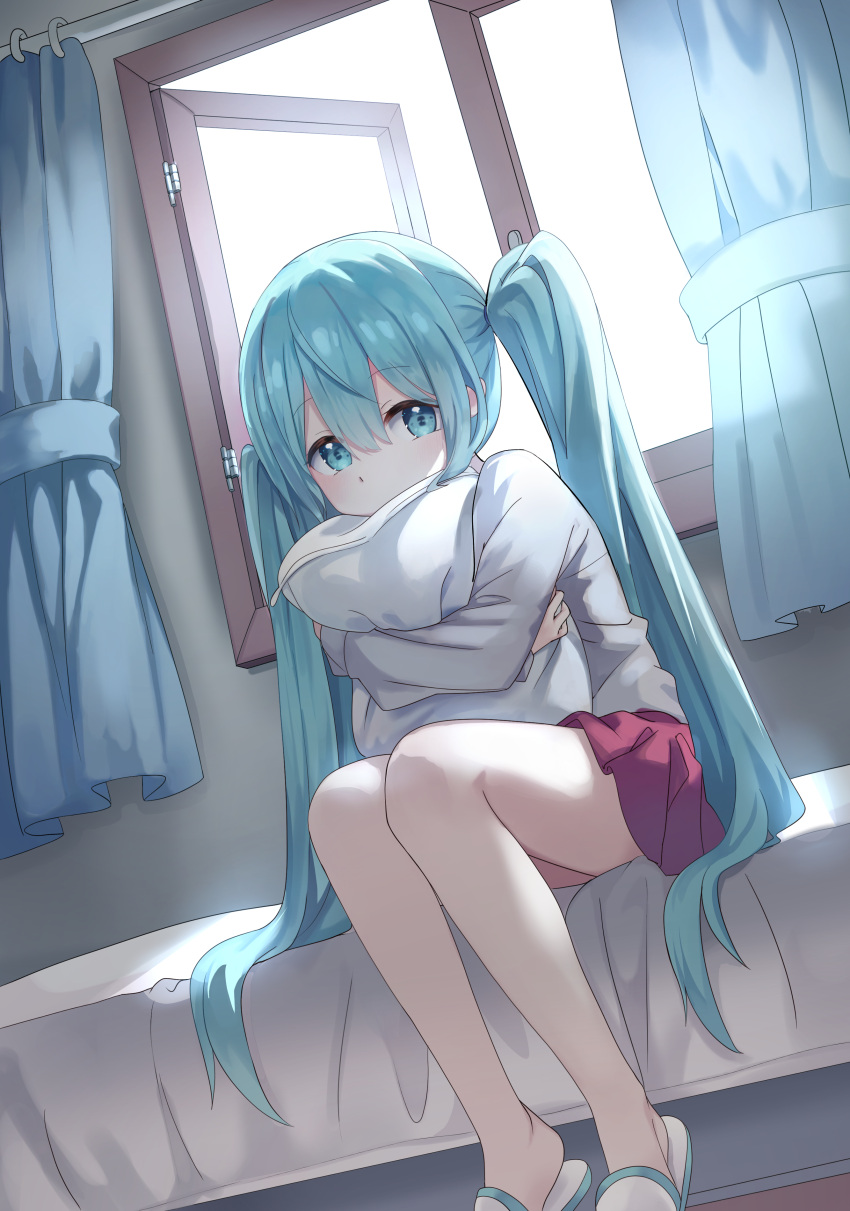 1girl absurdres bangs bed bedroom blue_eyes blue_hair dutch_angle grey_shirt hair_between_eyes hatsune_miku highres ille_(xcpa7325) indoors long_hair long_sleeves miniskirt object_hug pillow pillow_hug pleated_skirt red_skirt shiny shiny_hair shirt sitting skirt slippers solo twintails very_long_hair vocaloid